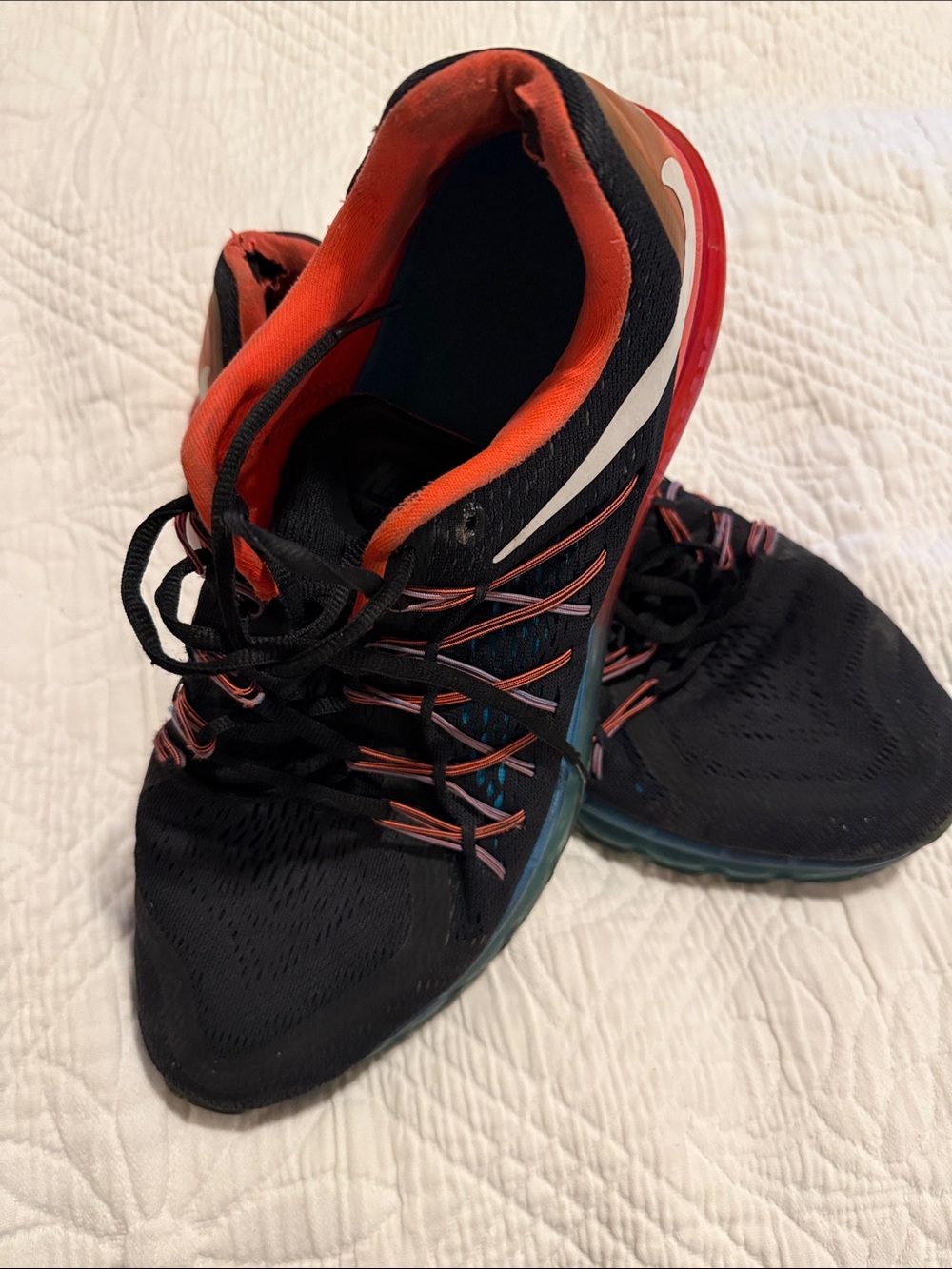 Nike Black Sneakers with Orange Interior and Red Heel Accent